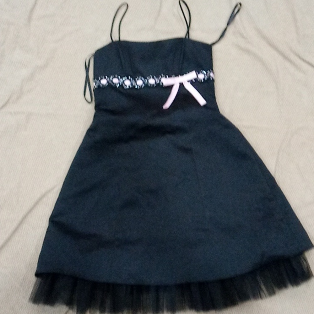 Betsy and Adam Black with a little pink one the top very nice quality
